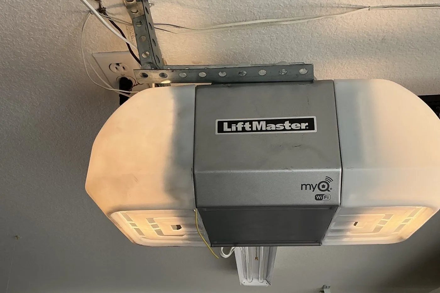 LiftMaster opener with myQ Wi-Fi mounted to a garage ceiling